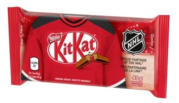 A KitKat chocolate bar in red packaging featuring a red hockey jersey design with the KitKat logo, NHL shield, and 'Proud Partner of the NHL' text.