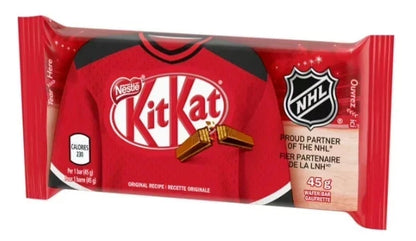 A KitKat chocolate bar in red packaging featuring a red hockey jersey design with the KitKat logo, NHL shield, and 'Proud Partner of the NHL' text.