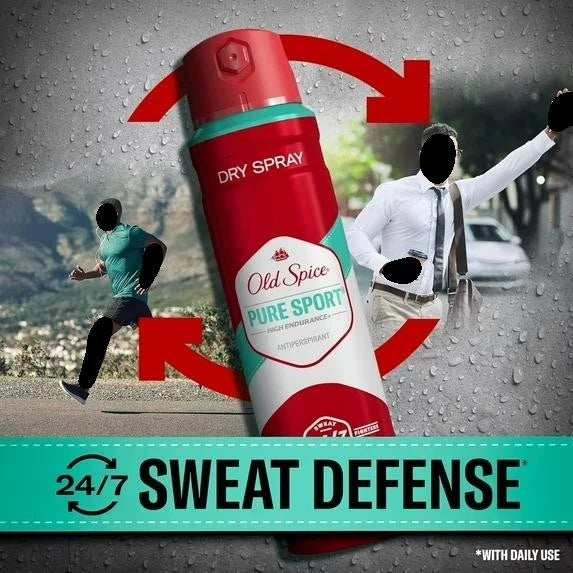 A red and teal Old Spice Pure Sport Dry Spray can is shown prominently in the center, with a blurred outdoor scene behind it featuring two running figures and red arrows indicating sweat prevention. Text at the bottom reads '24/7 SWEAT DEFENSE' and a small note says '*WITH DAILY USE'.