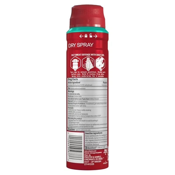 A red canister of Dry Spray personal defense spray, showing the back label with product facts, warning icons, and a barcode on a white background.