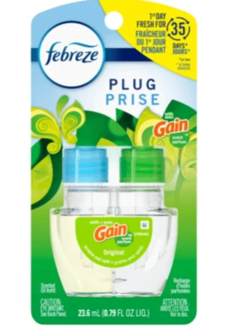 Febreze Plug Prise Gain Original 2-pack air freshener in its original retail blister packaging, featuring a blue and green design with a yellow '1st Day Fresh' banner.