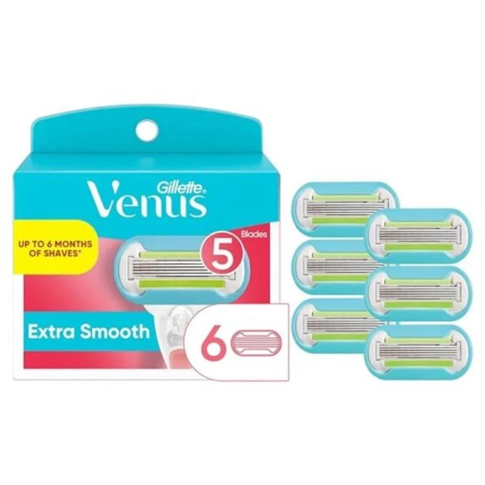 Gillette Venus Extra Smooth razor blade pack with six individual blades shown next to the retail box on a white background.