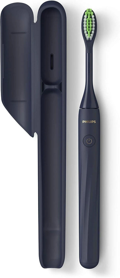 Navy blue electric toothbrush with green bristles and charging case on a white background