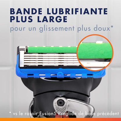 Shaving razor with green lubricant strip and blue handle on a gray background